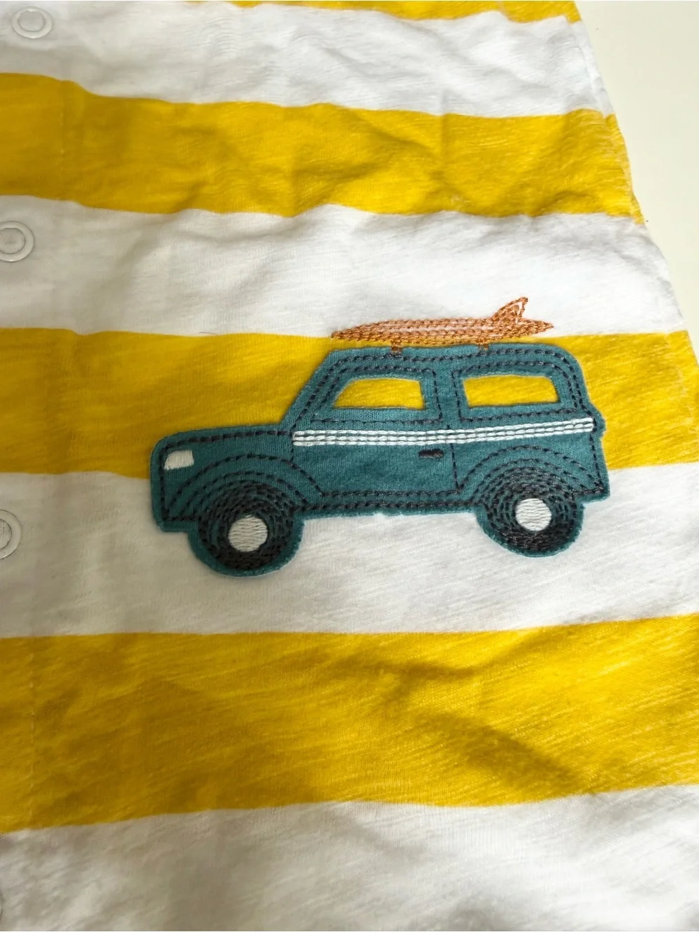 Two Carter's rompers- Striped Dino & Yellow Striped Baby 24m